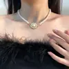 Dulce Collar Chanel Saturno Rodeado de Perlas Flor Cadena para Clavícula Elegante Retro Elegante de Lujo Alto de Moda