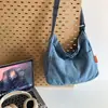 Nuevo bolso bandolera ins versátil para mujer estilo coreano estilo artístico bolso de hombro simple casual bolso tote de mezclilla para el día a día