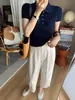 Camiseta de punto de seda helada azul marino con cuello polo, hombro derecho, manga corta para mujer, verano, elegante de alta gama, top ajustado con solapa