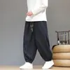 Pantalones de pana de pierna ancha con puños elásticos, adecuados para primavera y otoño, con estampado de cuadros, diseño retro estilo chino y corte holgado, oversized para hombre