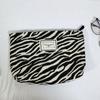 Bolsa de cosméticos con estampado de leopardo a rayas japonesa y coreana, bolsa de almacenamiento, bolsa de viaje portátil para cambiar el teléfono móvil, llave, bolso de mano ligero