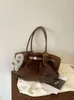 Bolsa de pelúcia estilosa transfronteiriça nova feminina 2026 design de nicho bolsa tote fofa para o dia a dia bolsa de ombro única