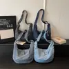 Bolso de mezclilla transfronterizo para mujer, bolso tipo dumpling, nuevo bolso cruzado grande de verano 2026 para estudiantes para la escuela