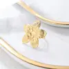 Explotaciones transfronterizas flor de cinco pétalos abierta anillo de acero de titanio temperamento de moda anillo para damas comercio exterior Europa y Estados Unidos joyería al por mayor