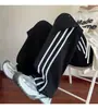 Calça Jogger Listrada Color Block Retrô da Moda 2026 para Homens e Mulheres, Caimento Solto, Primavera/Verão, Calça Longa Versátil para Casais