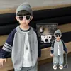 Venta al por mayor de cárdigans de punto de algodón para niños para exportación, adecuados para primavera y otoño, disponibles en tallas pequeñas y medianas para bebés y niños pequeños