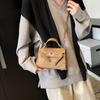 Bolso Kelly portátil de alta gama para mujer, nuevo estilo 2024, sencillo, estilo occidental, bandolera de moda que combina con todo.