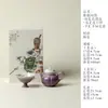 Diseño de interiores pintado a mano por Ino Kiyomatsu con motivos de glicinias, un juego de té kung fu de alta gama para una persona para beber de una tetera y una taza