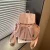 Mochila Feminina de Tecido Leve Versátil Transfronteiriça Outono 2026 Nova Casual Grande Capacidade Mochila de Costas Bolsa de Viagem Escolar