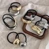 Anillo elástico para el cabello cóncavo-convexo de metal con personalidad y diseño de nicho, cuerda para el cabello geométrica de viento frío que combina con todo, cuerda para la cabeza con temperamento retro