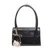 Versátil bolso pequeño de cuero encerado estilo ins para mujer, nuevo bolso cuadrado retro para el antebrazo 2026, bolso de hombro texturizado para el otoño/invierno