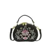 Bolsa Feminina Bordada Estilo Chinês Artístico 2025 Nova Moda Outono Pequena Redonda de Mão Versátil Bolsa de Ombro Transversal