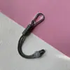 Hebilla para Mochila en Forma de D de Aleación de Zinc con Cordón de Paracord Trenzado Gancho de Hebilla de Resorte para Muñeca Multifuncional Llavero EDC Portátil Anti-Pérdida
