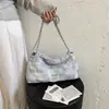 Bolso de Cubo de Moda para Mujer Tendencia de Agua Nueva Primavera 2026 Bolso Casual Textura Nicho Bolso de Hombro Individual Cruzado