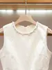 Nova coleção de verão de alta qualidade para mulheres em Shenzhen Nanyou: vestido elegante, com gola redonda, ricamente adornado com strass, franjado e justo, sem mangas
