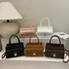 Bolso de Mano Pequeño Cuadrado Simple y Elegante Estilo Coreano para Mujer 2026 Nuevo Bolso de Hombro Versátil Casual Bolso Cruzado de Moda para Viaje