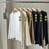 Capa base esencial para principios de primavera: Camiseta Básica Versátil de Manga Larga de Algodón para Mujer con Cuello Redondo, Adecuada para Usar en Capas y Uso a Largo Plazo