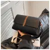 Bolso nuevo de comercio exterior para mujer, simple y elegante, con patrón de lichi, adecuado para ir al trabajo, tiene un tacto de alta gama, es de nicho y versátil, se puede llevar al hombro o cruzado, adecuado para comercio transfronterizo