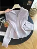 Elegante Cárdigan de Punto con Capucha de Ganchillo Hueco para Mujer Otoño 2026 Estilo Francés Perezoso Suéter A13418