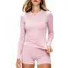 Conjunto de yoga de nailon en stock para mujer, corte ajustado, manga larga, conjunto deportivo de dos piezas, ropa de fitness negra, realza glúteos, control de abdomen, secado rápido