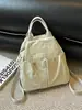 Bolso de hombro ligero Yuezhi 2026 principios de otoño con cordón, bolso tote casual de moda para ir al trabajo y la escuela
