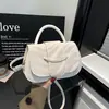 Bolsa texturizada popular estilo coreano, nova bolsa de ombro da moda outono 2026, versátil, simples e elegante bolsa tiracolo