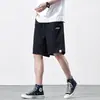 Pantalones cortos de algodón puro para hombre, nuevo estilo de verano 2026, pantalones casuales holgados de longitud media, pantalones de 5 puntos color caqui de alta gama