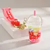 Famoso de Redes Sociales botella de arena movediza taza de té con leche llavero colgante creativo colgante de botella de arena movediza con aceite colgante pequeño para mochila escolar de estudiante