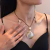 Nova Corrente de Clavícula Boêmia Estilo Transfronteiriço Dopamina com um Toque Único de Nicho de Luxo, Apresentando Colar de Cordão com Concha e Estrela do Mar