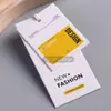 Logotipo de desenvolvimento de etiqueta de alta qualidade Padrão Roland Certificado de marca registrada de elevador espessado Design de cartão de etiqueta de roupa de produção