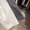 Camiseta de Manga Longa de Algodão Puro com Gola Redonda, Padrão de Desenho Animado com Letras, Corte Solto, Estilo Coreano Novo, Primavera e Outono de 2026 para Mulheres, Camiseta Básica Tendência