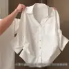 Moderna y nueva equipación de verano para mujer estilo coreano y universitario, simple camisa blanca de manga larga con cuello tipo Polo y falda corta plisada