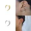 Pendientes de cuerno lisos elegantes de nuevo estilo para mujer, pendientes creativos de alto diseño europeos y americanos, joyería de mejor venta transfronteriza de comercio exterior