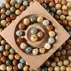 Accesorios de Cuentas Sueltas Talladas de Bodhi Natural Multi-Tesoro Colgante DIY Adorno Colgante Material para Pulsera para Mujeres