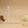 Botella de spray de perfume de vidrio transparente, botella recargable, botella de empaque cosmético sellada, botella portátil de viaje, botella vacía de muestra pequeña