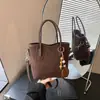 Bolso de hombro de moda transfronterizo para mujer, elegante diseño de bloques de color, bolso tote simple y versátil para el trabajo, retro y casual