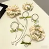 Elástico de Cabelo Flor de Lírio do Vale com Pingentes, Scrunchie Floral, Elástico de Cabelo para Meninas, Acessório de Cabelo