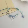 Pulseira de Corda Trançada Gato Branco para Mulheres, Novo Design de Nicho Estilo Chinês, Joia de Mão Simples, Elegante e Versátil Atacado