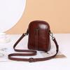 Nova Coleção Primavera/Verão 2026 Bolsa de Ombro Casual em Couro Bovino com Zíper Duplo para Mulheres Bolsa Pequena Transversal Vertical em Couro Genuíno Bolsa para Celular Feminina