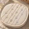 Collar de Trébol de Cuatro Hojas de Diez Flores con Incrustaciones de Diamantes para Mujer, Lujo Ligero, Diseño de Alta Gama, Sencillo, Moderno, Estilo Dulce, Versátil, Transfronterizo