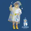 Impermeable infantil con capucha, impermeable de cuerpo completo, a prueba de lluvia, patrón de dibujos animados transparente, adecuado para niños y niñas, poncho para senderismo