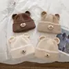Chapéu de Lã Estilo Coreano com Orelhas de Urso Fofas para Mulheres no Outono e Inverno Espessado e Quente Versátil que Valoriza o Rosto Pequena Proteção para Orelhas Chapéu de Tricô