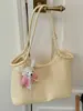 Bolsa de Ombro para Axila de Moda Transfronteiriça para Mulheres Verão 2026 Nova Bolsa de Ombro para o Dia a Dia com Toque de Luxo para Sair
