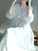 Vestido de Verão 2026 em Tecido Respirável de Algodão e Linho, Cor Rosa Pêssego Suave, Decote V com Amarração, Manga Média, Caimento Solto, Vestido Longo Valorizador e Emagrecedor