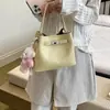 Bolsa de mão transfronteiriça moderna e super popular para mulheres, novo modelo 2026, adequada para o trabalho e o trajeto, bolsa estilo saco elegante e bonita, bolsa transversal