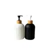 Botellas de gel antibacterial de colores, botellas dispensadoras de loción y gel de ducha para hoteles transfronterizos, botellas de champú de rayas verticales, botellas de vidrio