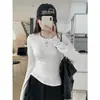 Venta al por mayor transfronteriza Otoño e Invierno Terciopelo Alemán Estilo Coreano Hombro Derecho Ajustado Elegante Camiseta de Manga Larga para Mujer Camisa Base Cálida de Espina de Pescado