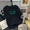 Camiseta de manga corta de estilo americano moderna para hombre, cuello redondo de verano, versátil casual, nuevo estilo 2025, marca de moda, camiseta holgada estilo Hong Kong