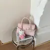 Bolso de Mano de Alta Gama Transfronterizo para Mujer Primavera 2026 Nuevo Elegante Retro de Viaje Hombro Cruzado Bolso de Nicho