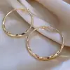 Brincos de Argola Grande Mobius Europeus e Americanos para Mulheres, Elegantes de Nicho, Únicos, Exagerados, de Alta Qualidade, Luxo Acessível e Brincos Versáteis